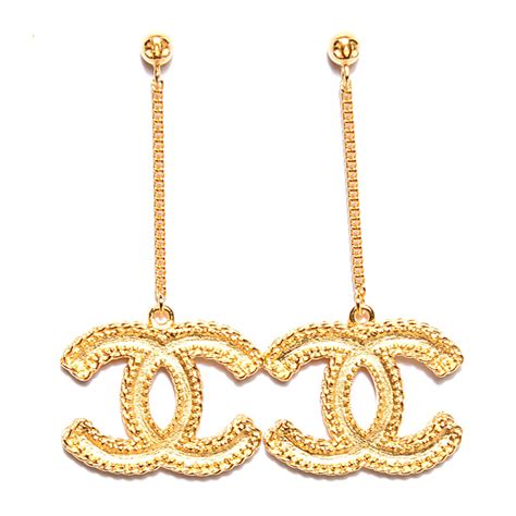 chanel gold cc dangle piercing earrings|Chanel cc earrings price list.